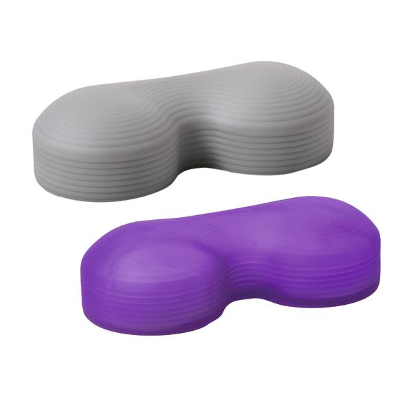 Ergonomische Sitzkissen in Grau und Lila mit gewellter Oberfläche für Komfort und Haltung.