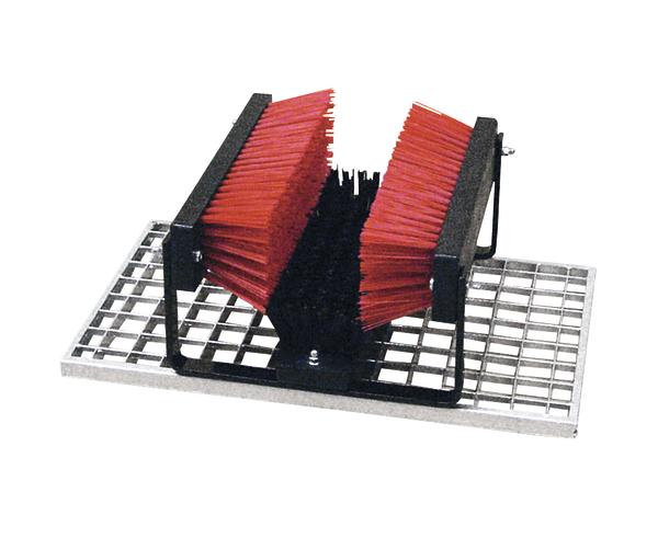 Schuhputzmaschine mit roten Bürsten auf Metallgitter zur Reinigung von Schuhsohlen.