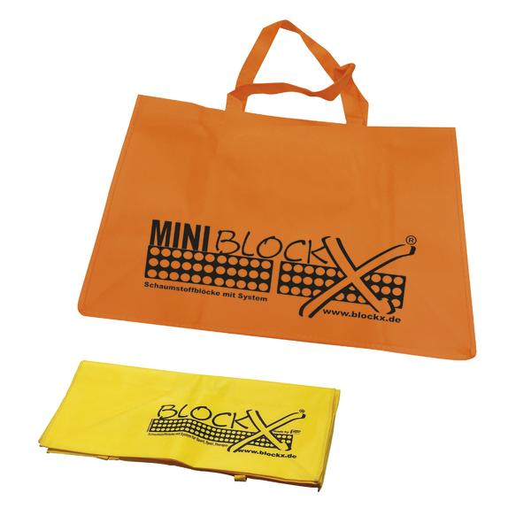 Orange Tragetasche und gelbe Hülle mit BlockX Logo für Schaumstoffbausteine.