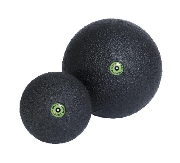 Zwei schwarze Faszienbälle in unterschiedlichen Größen für Muskelentspannung und Massage.