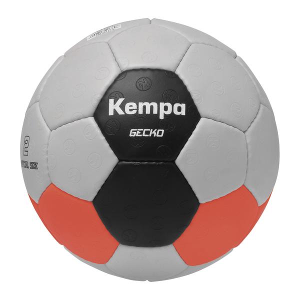 Grau-schwarzer Handball mit strukturierter Oberfläche, orangefarbenen Segmenten und der Aufschrift „Kempa Gecko“.