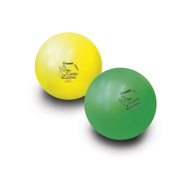 Zwei farbige Gymnastikbälle in Gelb und Grün für Fitness und Therapie.