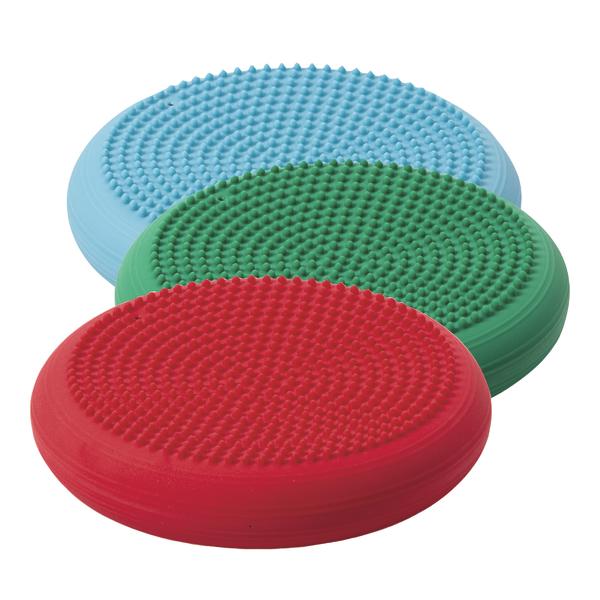 Rote, grüne und blaue Balance-Scheibe mit Noppen für Gleichgewichtstraining und Therapie.