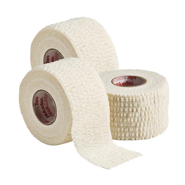 Drei Rollen elastisches Sporttape in Beige für Stabilisierung und Schutz bei Sportverletzungen.