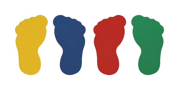 Bunte Bodenmarkierungen in Gelb, Blau, Rot und Grün auf weißem Hintergrund.