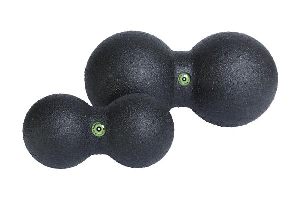 Schwarze Faszien-Doppelball-Massagegeräte in zwei Größen für Muskelentspannung und Triggerpunkttherapie.