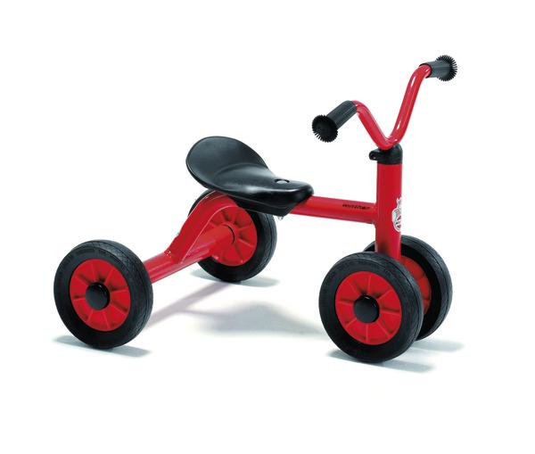 Rotes Kinder-Dreirad mit schwarzem Sitz und Griffen, robustes Spielzeug für Kleinkinder.