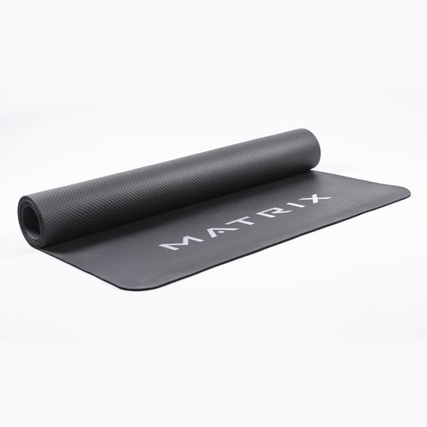 Schwarze, teilweise aufgerollte MATRIX Unterlegematte mit strukturierter Oberfläche.