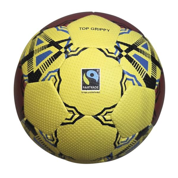 Gelber SAMBA Handball mit blau-schwarzem Grafikdesign, strukturierter „Top Grippy“-Oberfläche und sichtbarem FAIRTRADE-Siegel