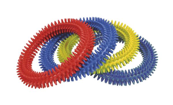 Vier bunte, stachelige Noppenringe in Rot, Blau, Gelb und Grün auf weißem Hintergrund.