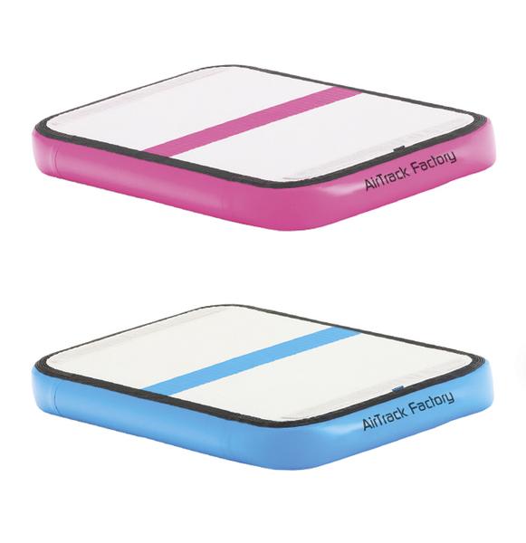 Aufblasbare Airtrack Matte in Pink und Blau für Gymnastik und Training.