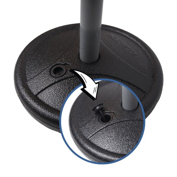 Runder schwarzer Standfuß mit eingesetzter Stange und markierter Öffnung im Detail.