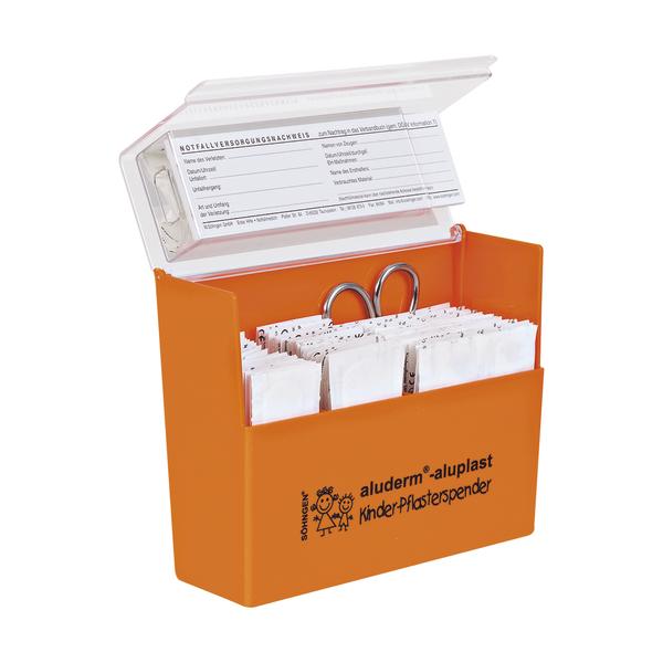 Oranger Kinder-Pflasterspender mit Pflastern und Schere, geöffneter Deckel mit Notfallvorsorgehinweis.