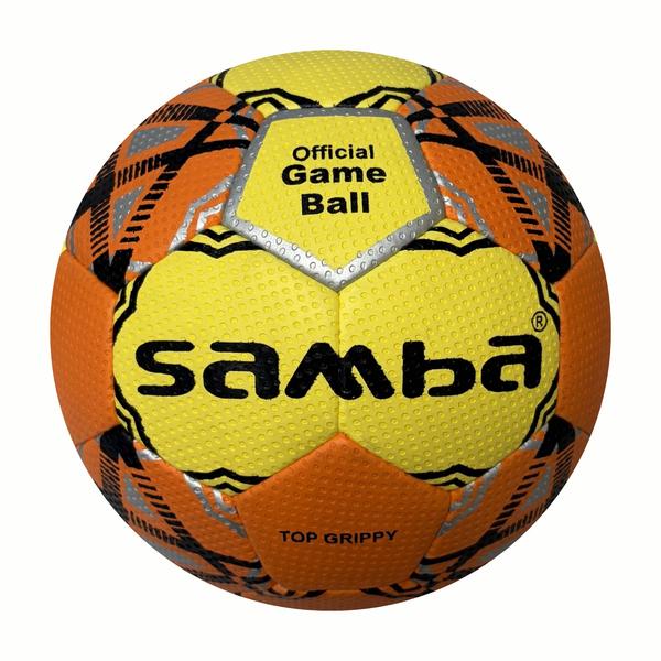 Gelb-oranger SAMBA „Official Game Ball“ Handball mit schwarz-silbernem Grafikdesign und strukturierter „Top Grippy“-Oberfläche.