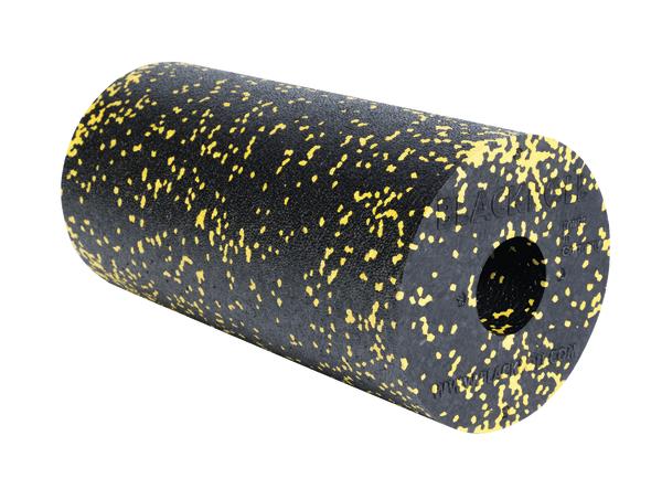 Schwarze Faszienrolle mit gelben Punkten, zylindrisch, für Muskelentspannung und Massage.