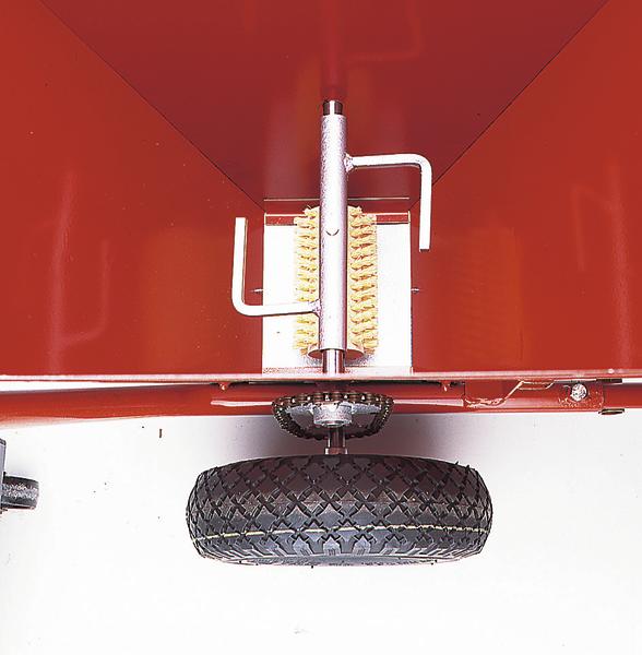 Detailaufnahme eines roten Geräts mit Reifen und Bürstenmechanismus zur Markierung.