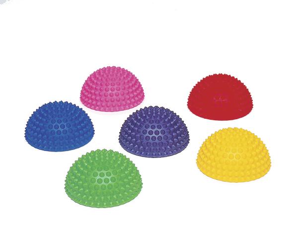 Bunte halbrunde Balance-Steine mit Noppen für Koordination und Gleichgewichtstraining.