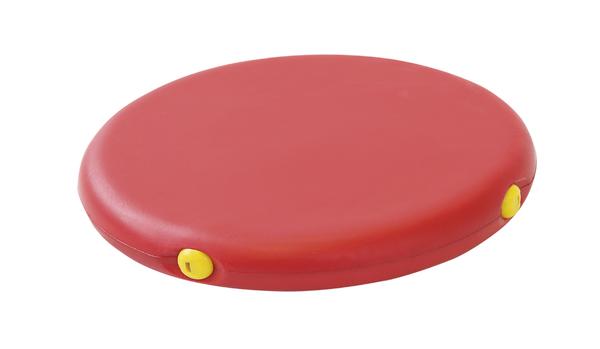 Roter Balance-Disc mit gelben Ventilen für Gleichgewichtstraining und Stabilitätsübungen.