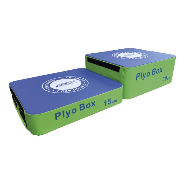 Zwei weiche Plyo-Boxen in unterschiedlichen Höhen (15 cm und 30 cm) mit blauer Oberseite und grünem Korpus, ausgestattet mit seitlichen Griff- und Klettflächen für sicheres Stapeln.