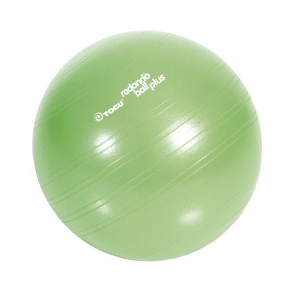 Grüner Gymnastikball mit Rillen, Fitness- und Therapieball für Training und Rehabilitation.