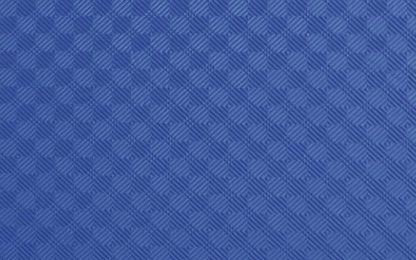 Nahaufnahme von Muster einer blauen Gymnastikmatte aus Weichschaum.