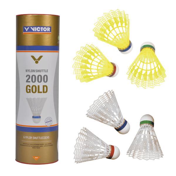 Victor Nylon Shuttle 2000 Gold-Federballdose mit drei weißen und drei neongelben Federbällen daneben.
